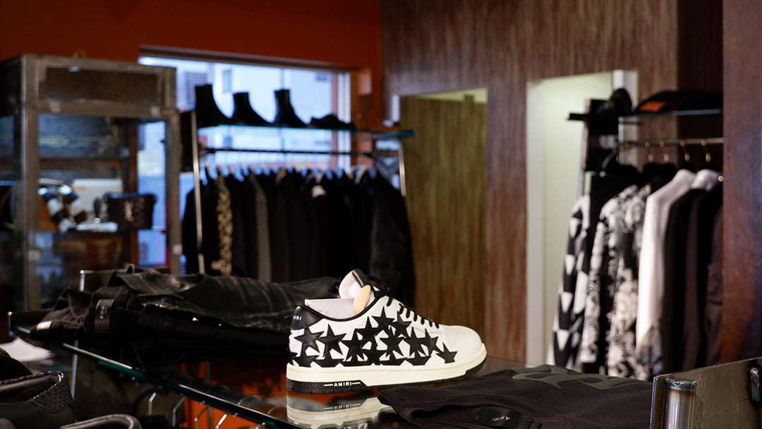 Zoo Fashions. Brick-and-mortar mens designer clothing store in Ilford Essex. Store Interior. Stockist of designer brands including Y-3, Lanvin, Nahmias, Amiri and more. Amiri staples MA-1 trainers, MA Runner and Stars Low.
