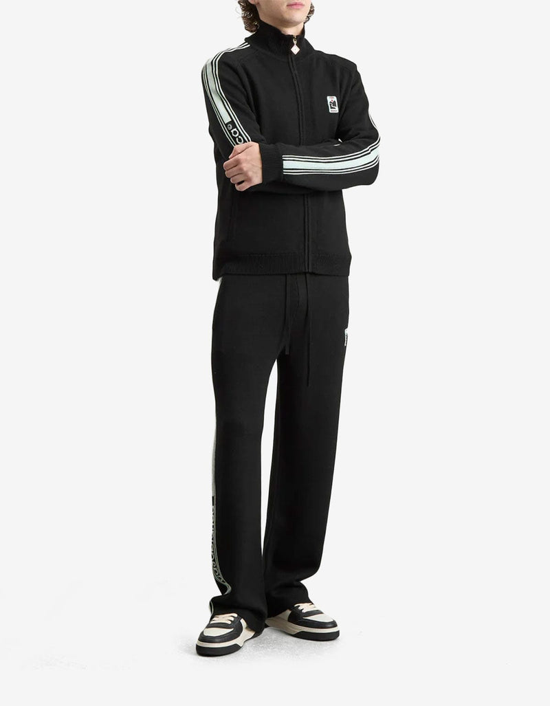 Casablanca Black Merino Wool Track Jacket MPF25-KW-1003-01. Black tracksuit with stripes on sleeves, and a logo on the chest