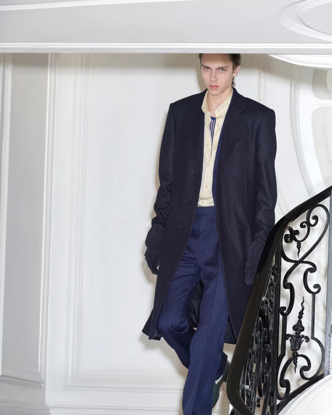 Givenchy men's clothing, striped wool trousers. Givenchy Archetype logo. Spectre runner
