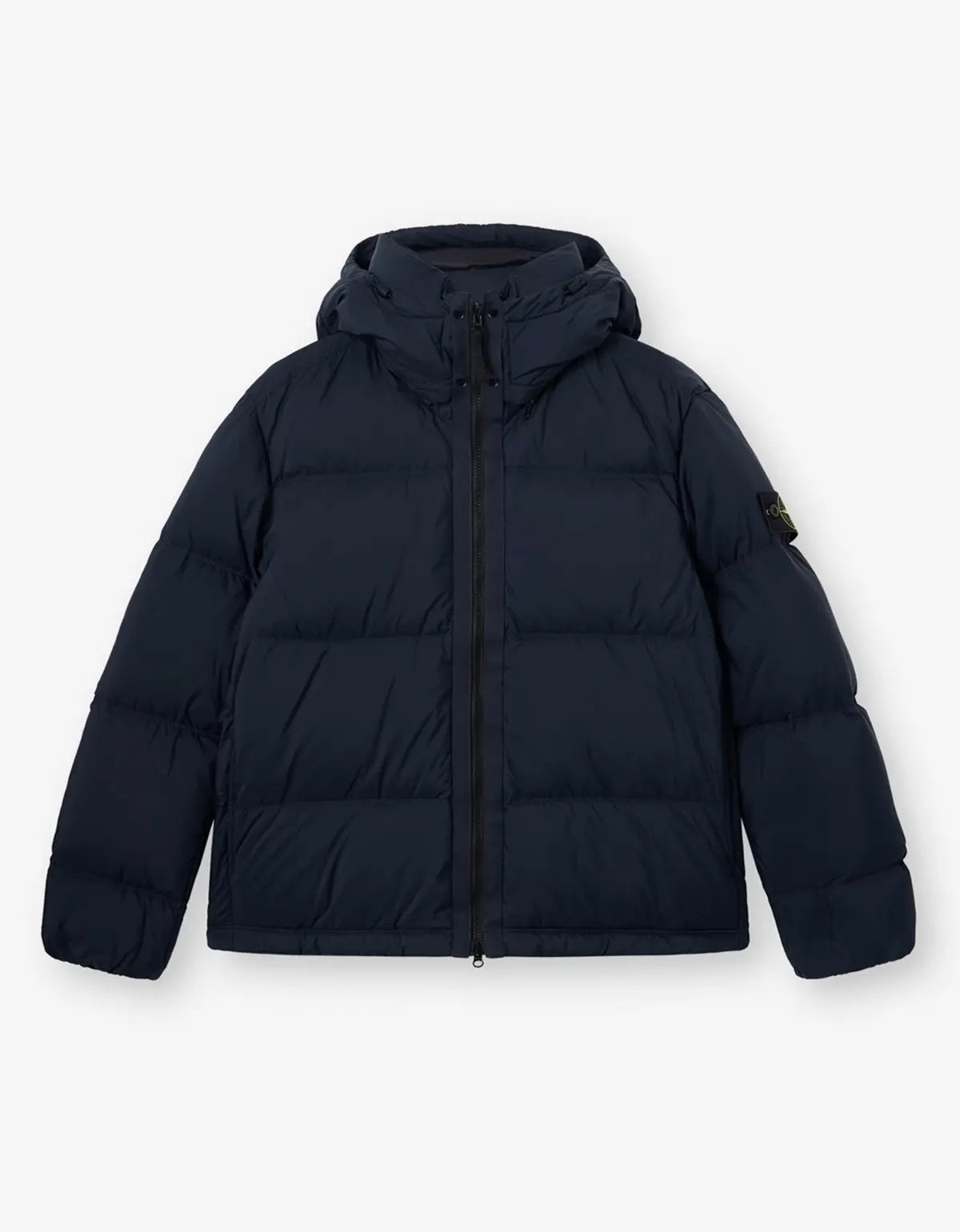 A dark navy blue hooded puffer jacket with horizontal quilting, a front zipper, and a small black brand patch on the left sleeve, displayed against a light gray background.