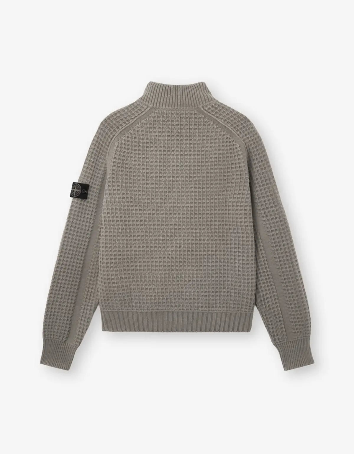 A gray waffle-knit mock neck sweater shown from the back, featuring a black woven brand patch on the left sleeve, set against a clean white background.
