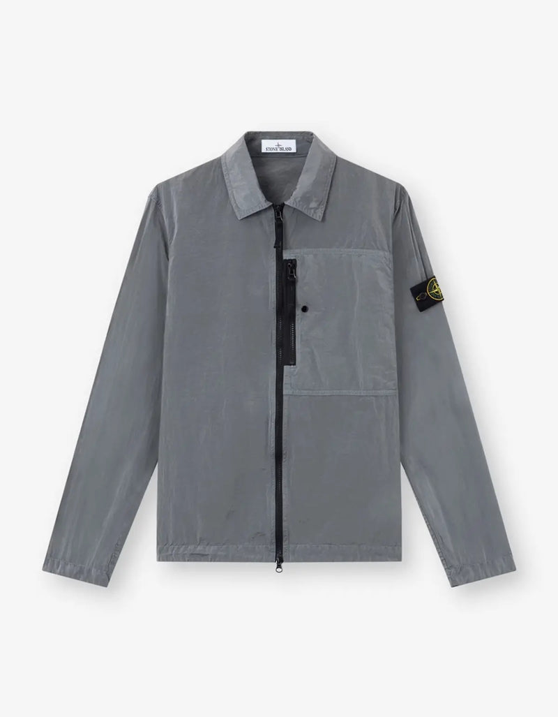 A women's long-sleeve button-up shirt in dark navy blue, featuring a gathered ruched front detail and a classic collar, shown against a light off-white background.