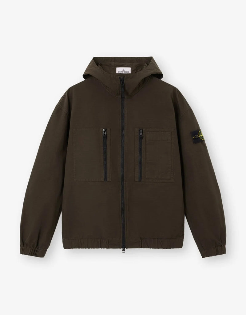 A dark brown hooded zip-up jacket with two vertical chest zip pockets, elasticized cuffs and hem, and the Stone Island compass patch on the left sleeve, shown on a light gray background.