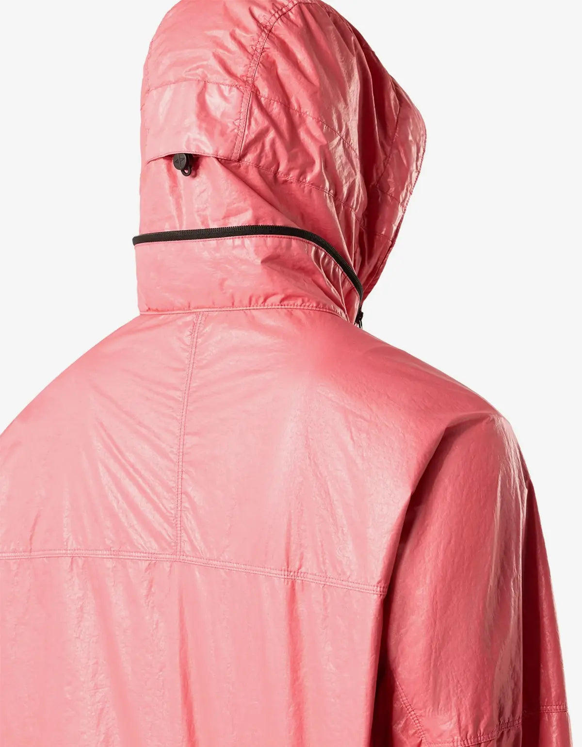 Close-up back view of a person wearing a shiny pink hooded jacket with a black chin strap, against a light gray studio background.