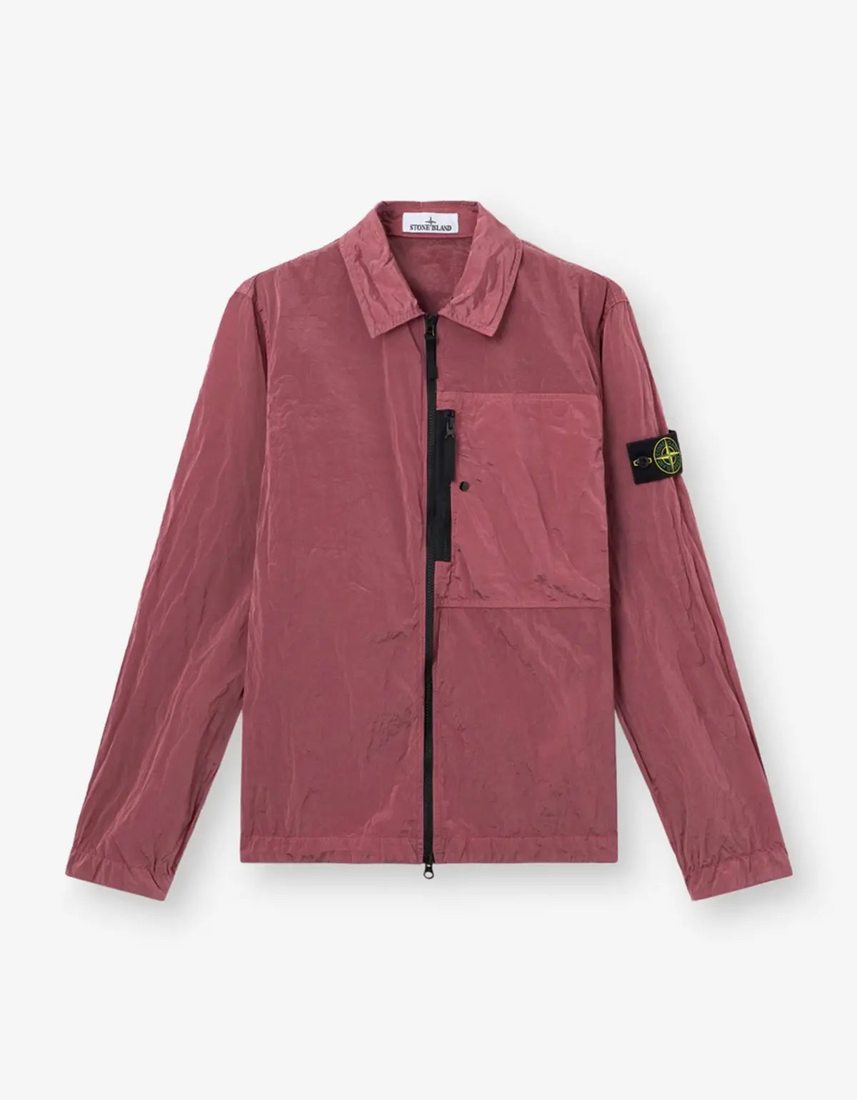 A Stone Island zip-up utility jacket in a dusty rose color, featuring the signature compass patch on the left sleeve, displayed against a clean white background.