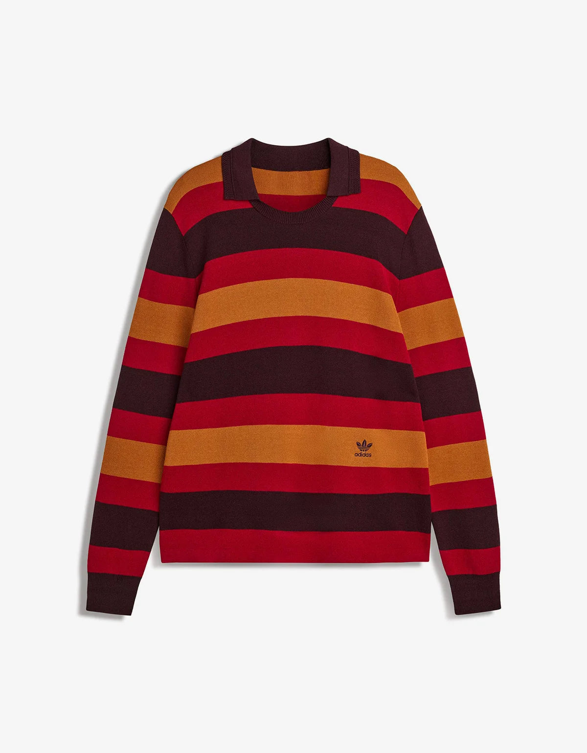A long-sleeve striped knit sweater with horizontal bands of dark burgundy, red, and mustard yellow, featuring a dark collar and a small black Adidas trefoil logo on the lower left front, set against a light gray background.